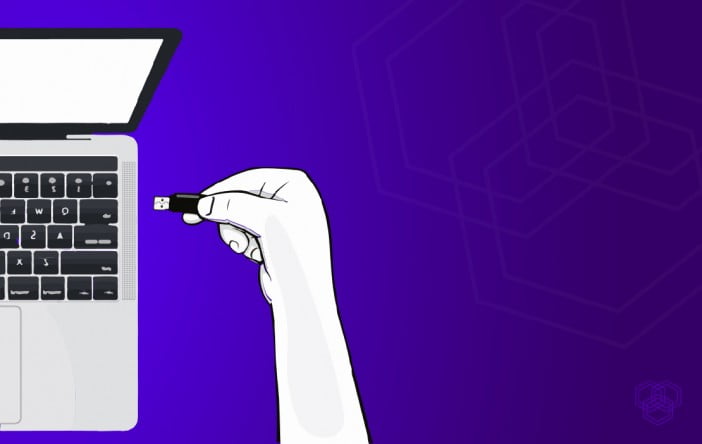 How To Make A Bootable Usb 1 An Illustration Of A Person'S Hand Plugging A Usb In A Laptop