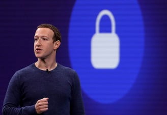 Picture of Mark Zuckerberg delivering a speech, facebook year 2018 review