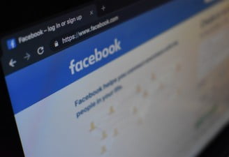A computer screen with Facebook website open