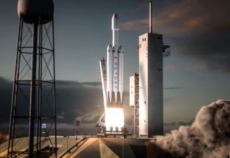 A picture of SpaceX rocket igniting for a mission to Space