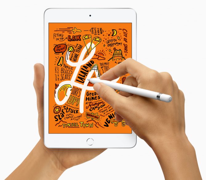 Apple Updates Ipad Air And Ipad Mini With Beefy Hardware 1 A Person Doodling On Ipad Mini With Apple Pencil