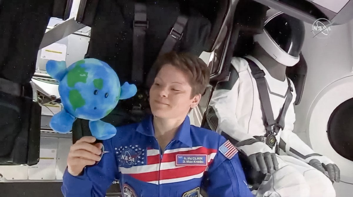 Nasa Confirms First All-Female Spacewalk Later This Month 2 A Photo Of Woman In Space With Spacex'S Special Suite And A Toy Earth