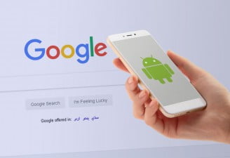 A picture of Android phone with Google search logo in background