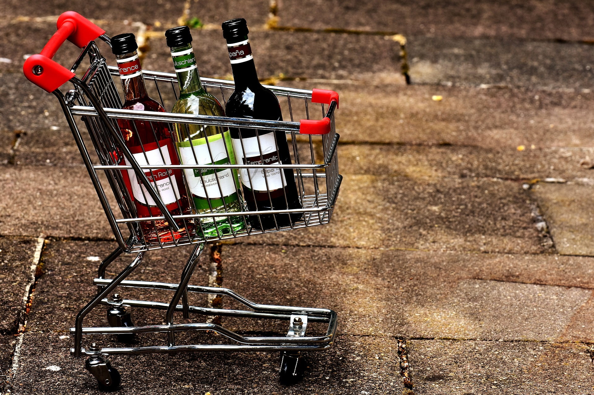 Drunk Shopping Could Be A $45 Billion Industry 2 A Photo Of Shopping Cart With Three Different Drinks In It