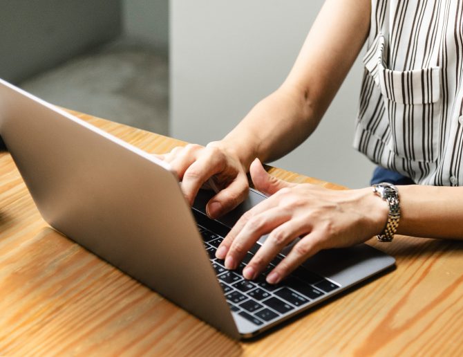 How To Increase Your Internet Speed 1 A Woman Working On Her Laptop