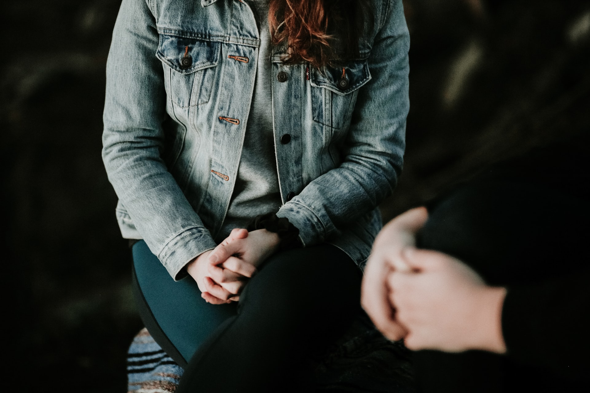 A woman sitting in therapy