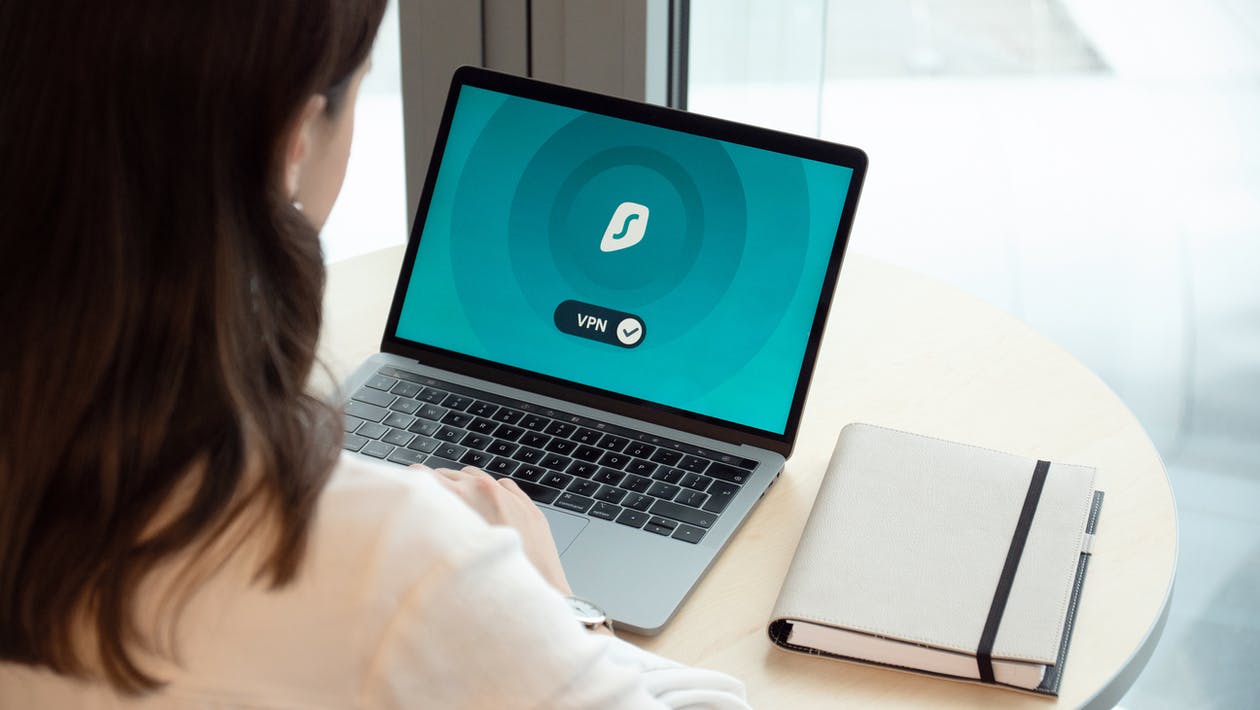 A person using VPN on a laptop