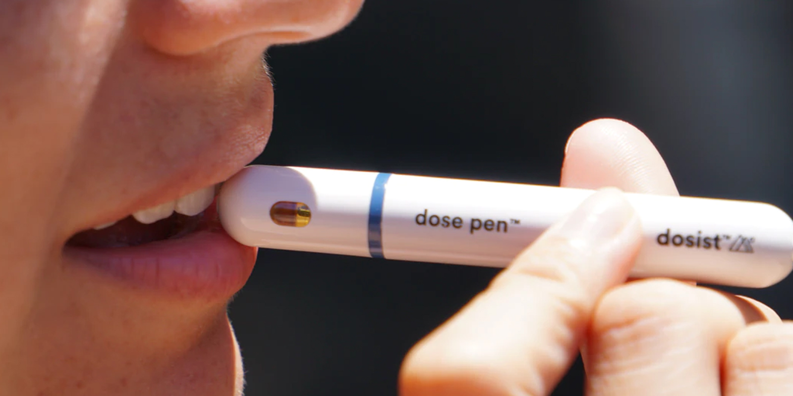 A girl using a vaping device