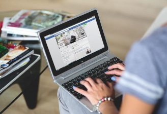 A person using a computer Description automatically generated