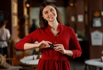 A girl holding earphones