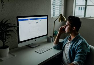 A person looking at a computer