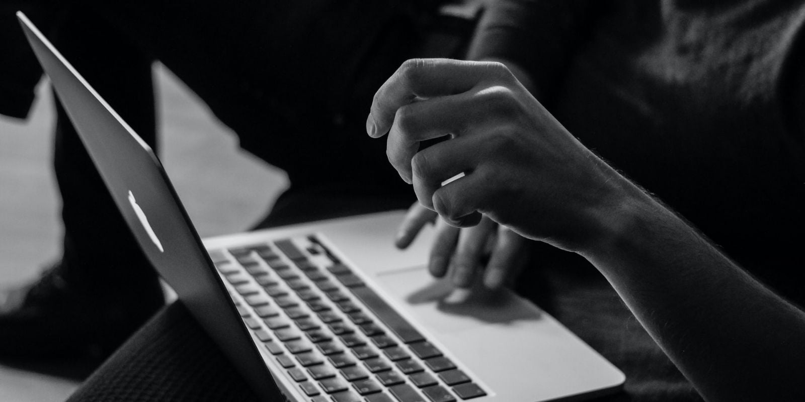 A person working on a notebook